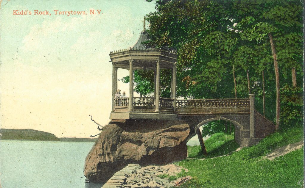 An historic postcard of Kidd Rock on the shore of the Hudson River in Kingsland Point Park, Sleepy Hollow, New York.