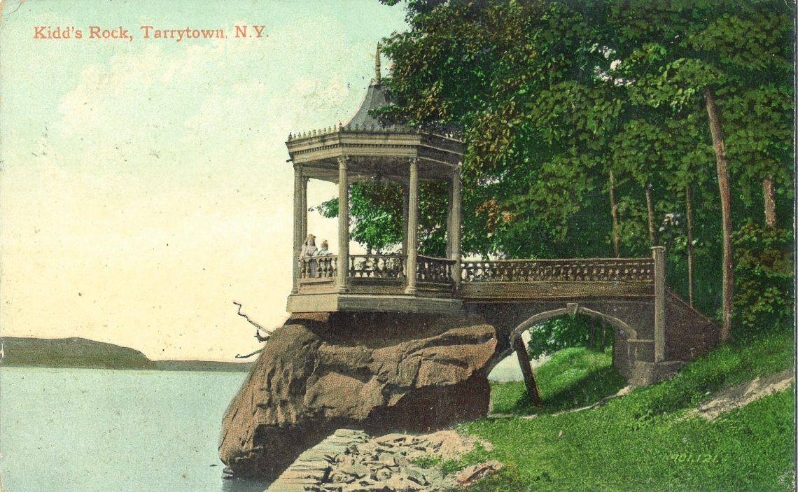 An historic postcard of Kidd Rock on the shore of the Hudson River in Kingsland Point Park, Sleepy Hollow, New York.
