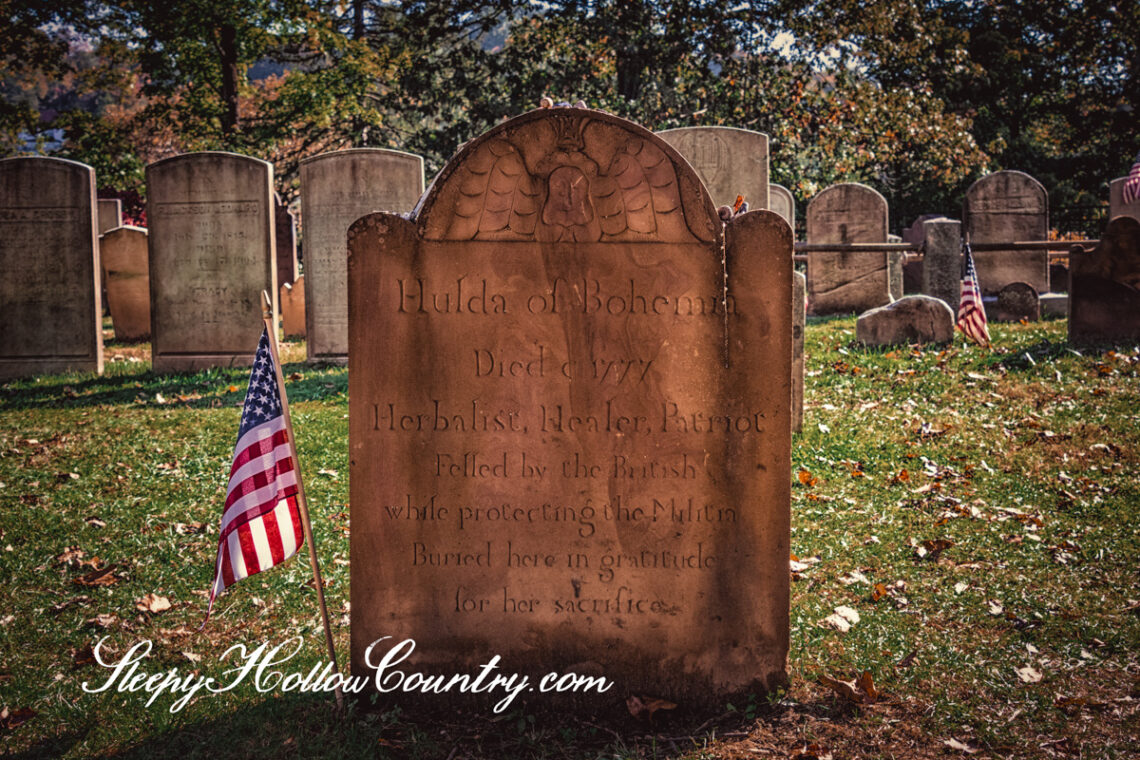 The 2019 sandstone grave stone of the Edgar Mathew Bacon character Hulda The Witch.