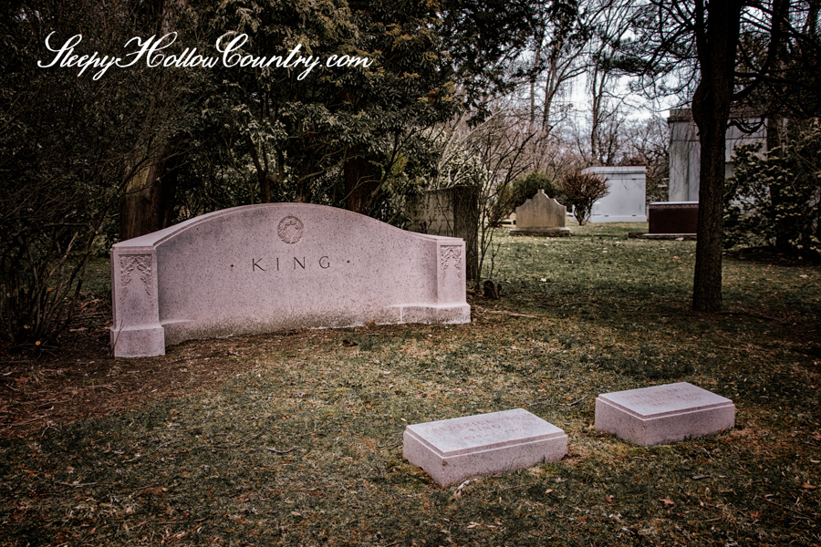 The pink granite monument for Frederick and Sybil Harris King is in Sleepy Hollow Cemetery. The ghost of Sybil Harris King is reputed to linger at her former home.