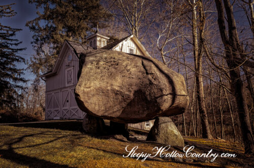 The Balancing Boulder of North Salem sits beside Titicus Road.